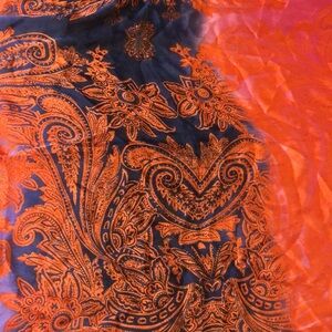 Authentic 100% Silk scarf. Made in China.